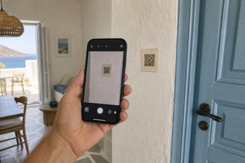 A guest scans the guidebook QR with their phone
